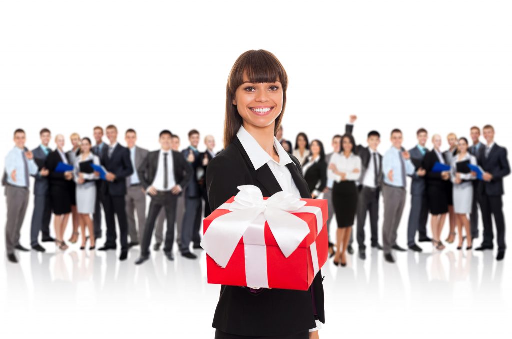 Photo of a Realtor Holding a Client Gift